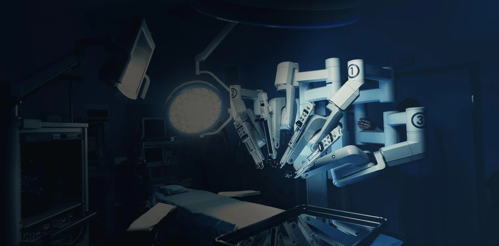 Da Vinci Xi robotic surgical equipment beside an operating bed